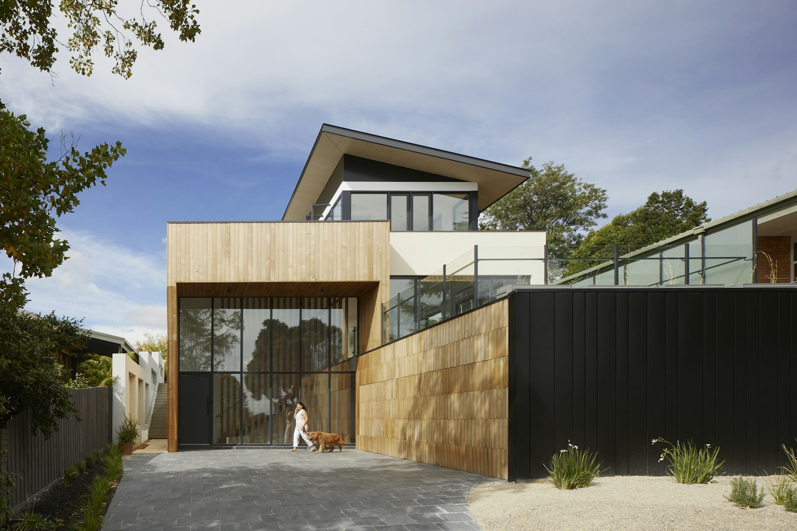 Covered outdoor living space attached to a home